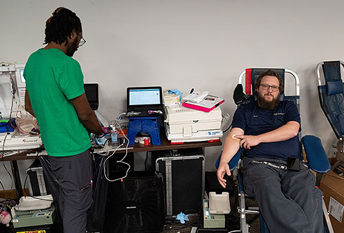 Employees making a blood donation